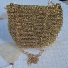 Kadın Altın Rengi Metalik İp Zincir Saplı Çanta Hand Made El Örgüsü Kadın Altın Rengi Metalik İp Zincir Saplı Çanta Hand Made El Örgüsü